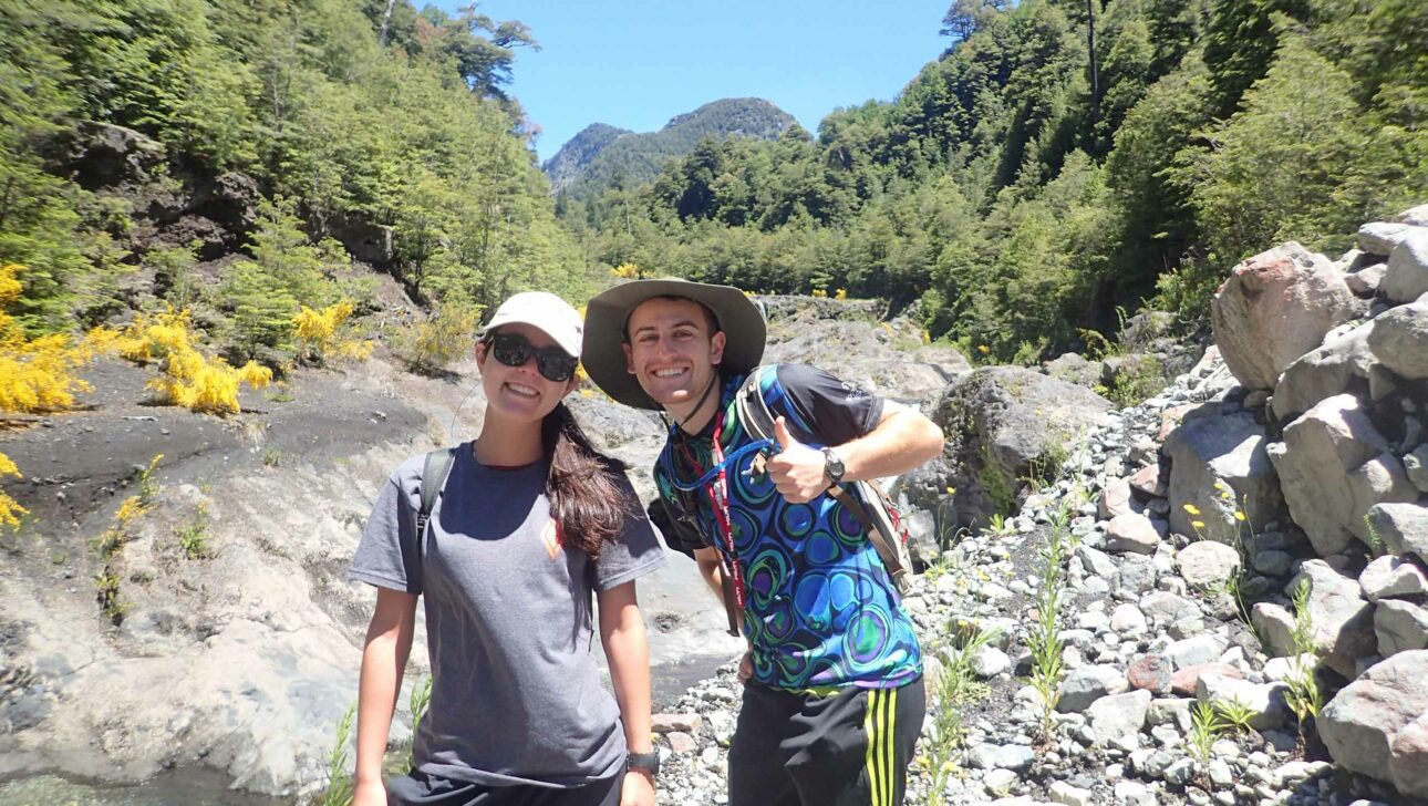 Two adults smiling.