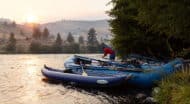 A person organizing rafts.