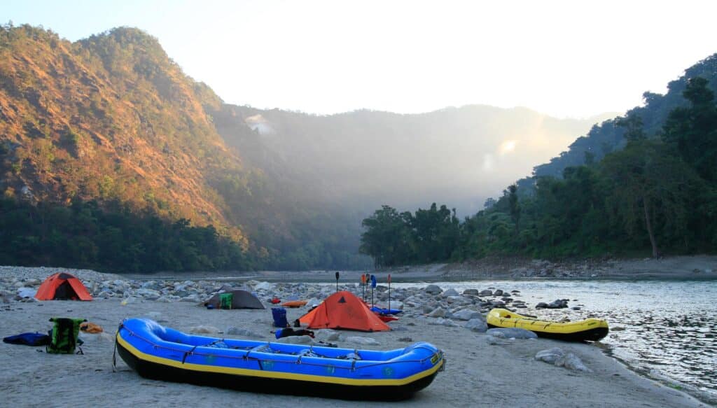 Rafts on the shore of a river.