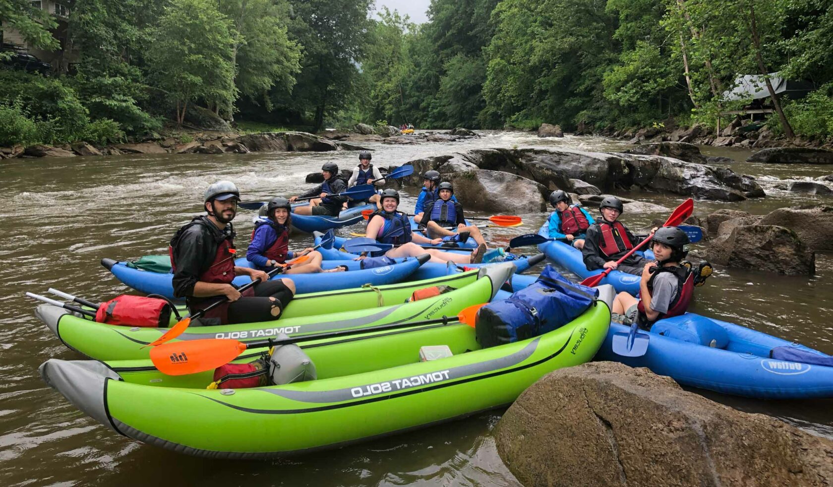 A group of people on kayaks.