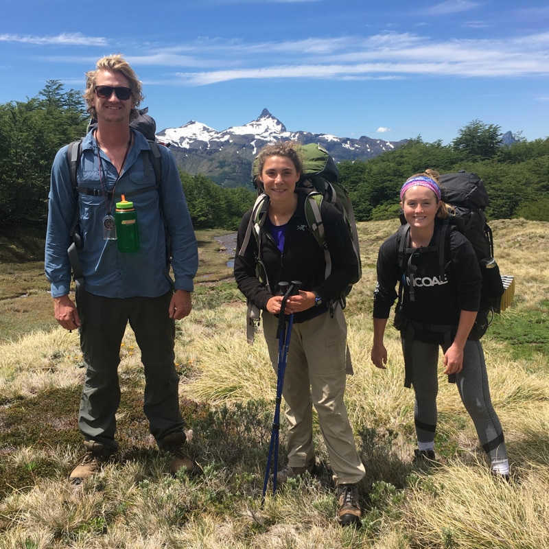 Three adults backpacking in Patagonia.