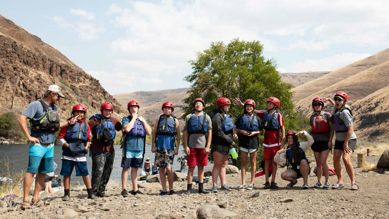 A group of students ready for whitewater paddling.