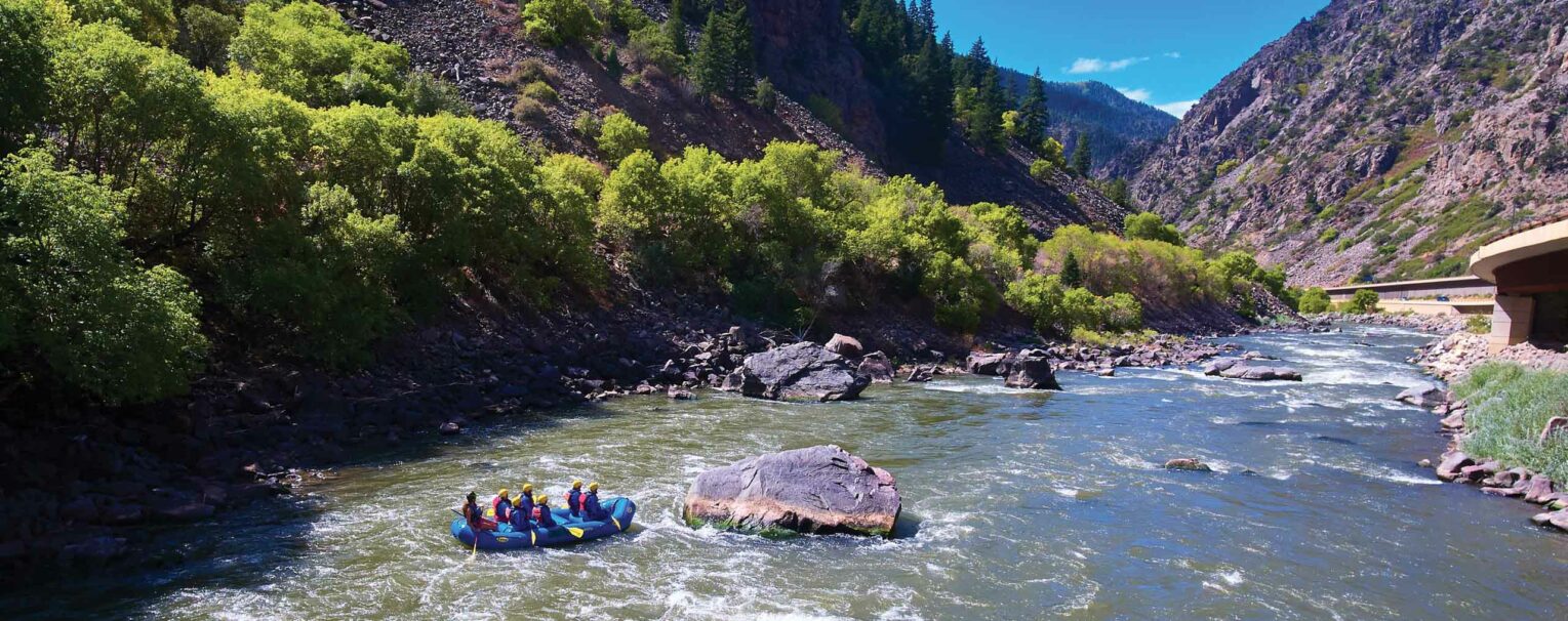 An aerial view of a group of people on a raft.