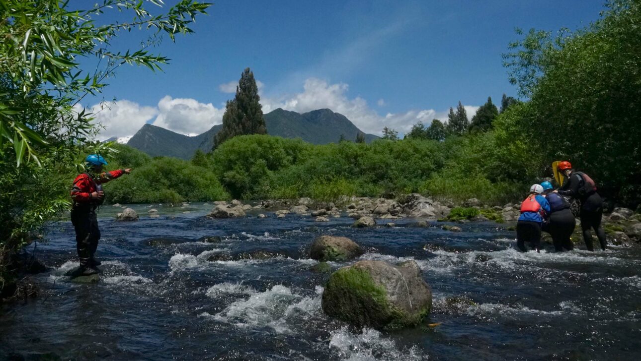 People standing in a river.