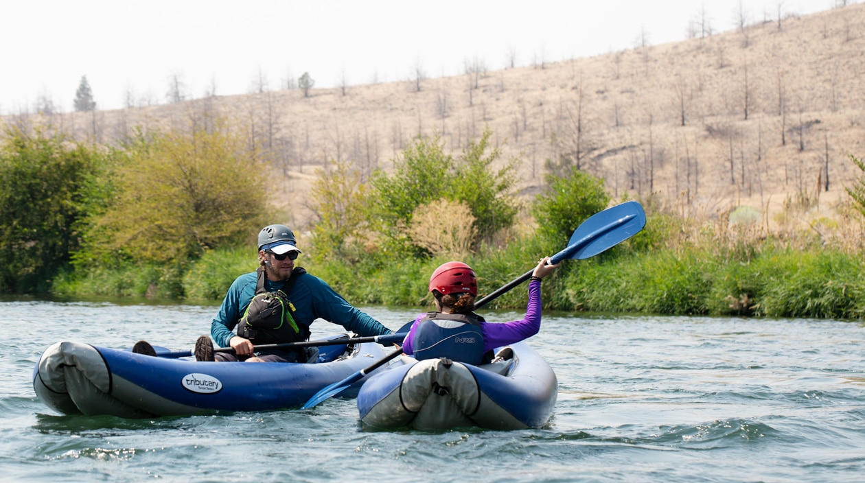 Two people kayaking.