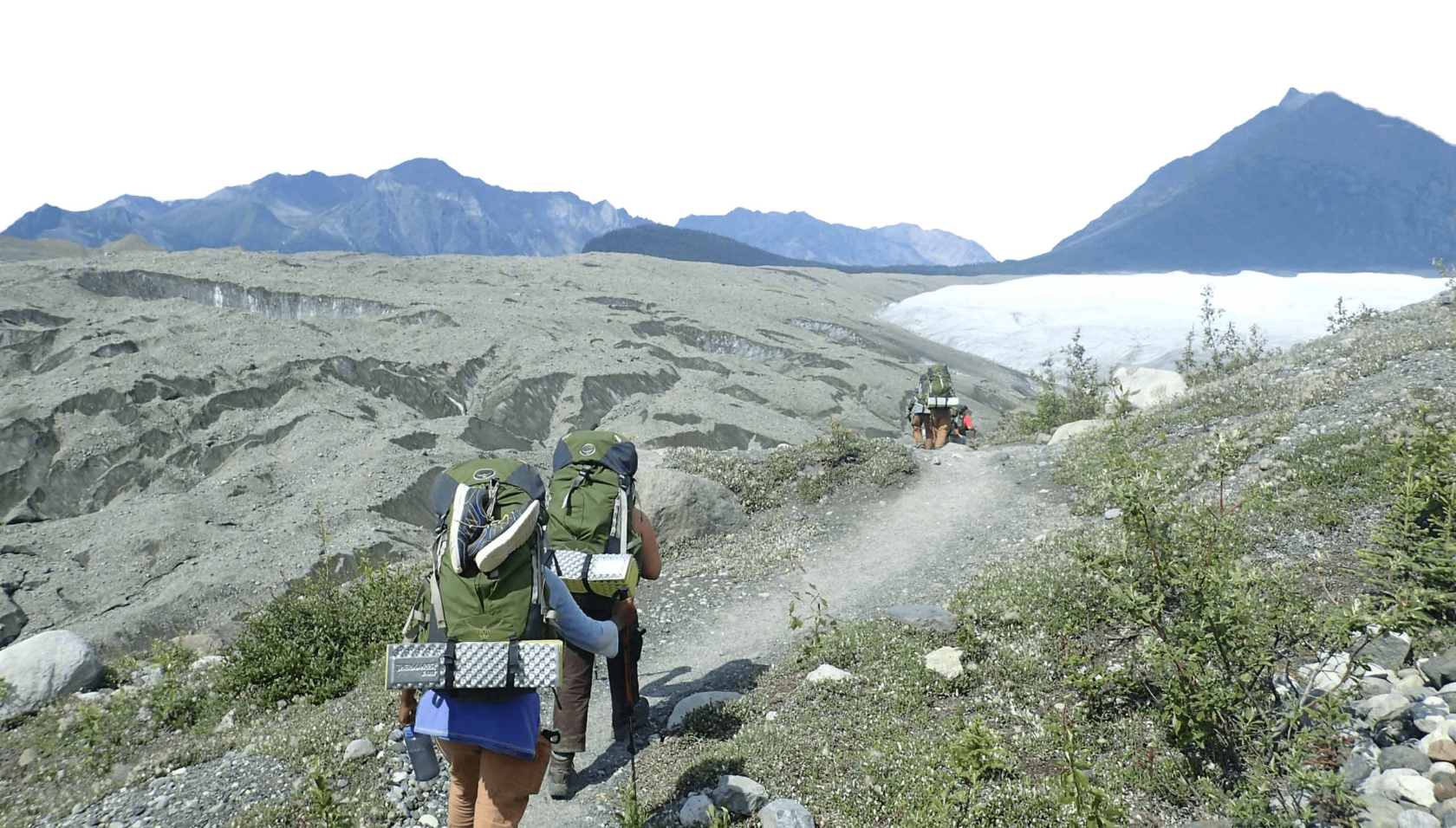 A group of people backpacking in Alaska.