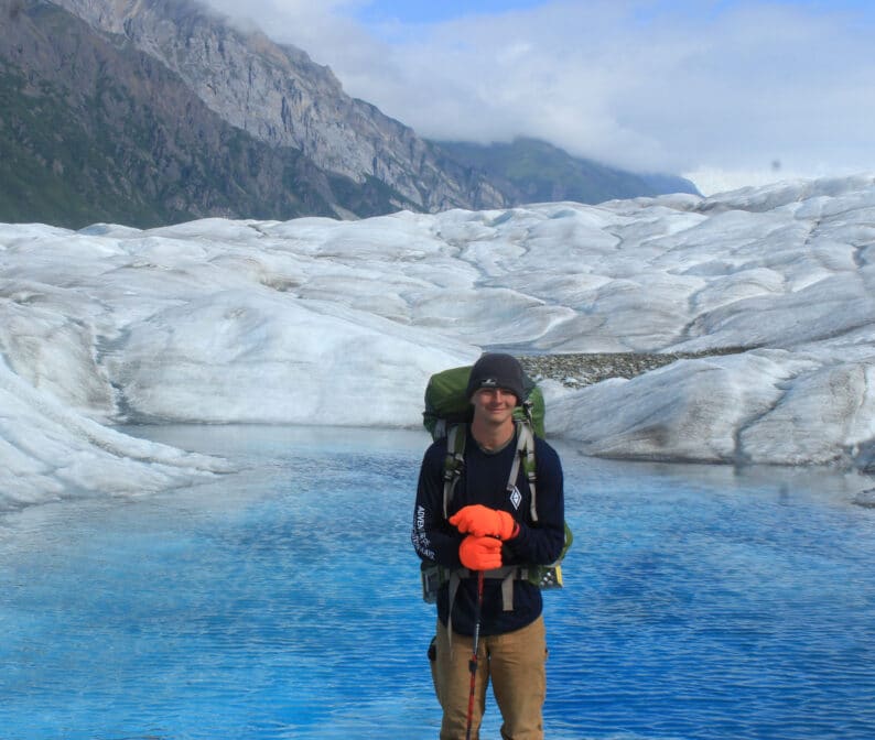 A teenager backpacking in Alaska.