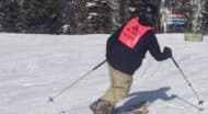 Still in love with the sport even after he lost his vision, Zac Adair drops a knee at Copper Mountain Resort, CO.