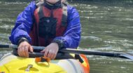 NCOAE staff member Lydia S sitting in a kayak on the water.