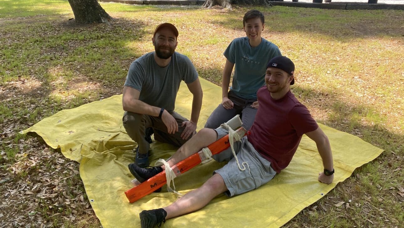 Man with leg in makeshift splint during NCOAE training