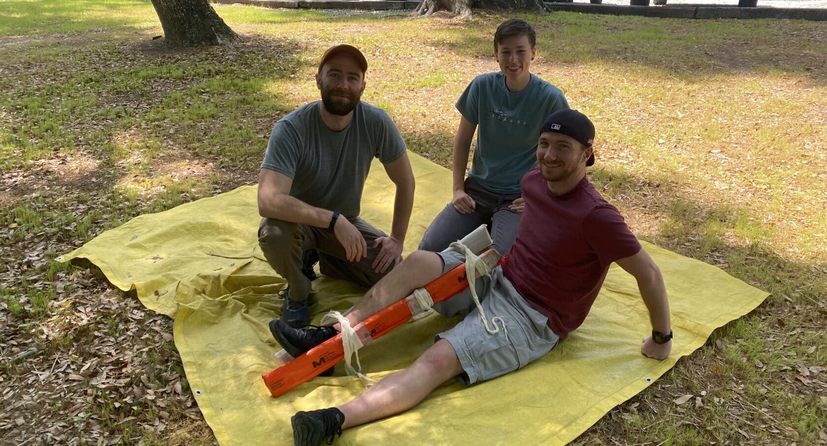 Man with leg in makeshift splint during NCOAE training